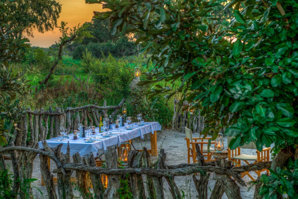 Candle lit dinner under African skies